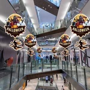 Set of Halloween paper hanging decorations with pumpkin and witch designs for mall decor