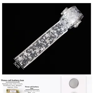 Detailed view of silver Christmas star ribbon with LED battery box specs