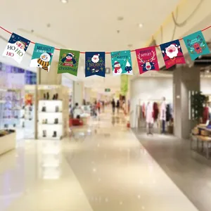 Festive Christmas bunting banner with colorful cartoon character flags for party decor.