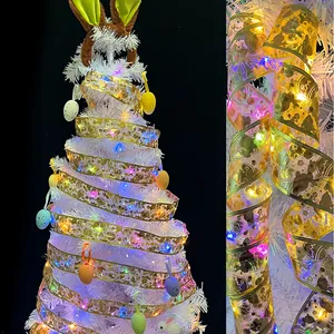 Detailansicht der goldenen Oster-Lichterkette mit Bronzierungsdruck und LED-Leuchten