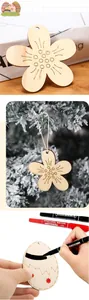 Detail view of DIY wooden Easter ornaments showing engraved flower and egg designs