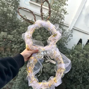 Ghirlanda di coniglio pasquale con luci LED calde e rete bianca per la festa decorativa