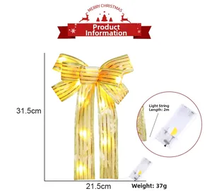 Vue détaillée du nœud de Noël doré illuminé avec guirlande de 2m et boîtier pile