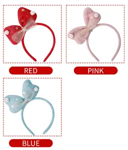 Christmas bow headbands in three colors: red, pink, and blue with snowflake details