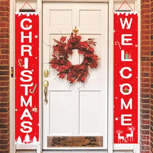 Christmas Welcome door banners hanging on a white door with a festive wreath
