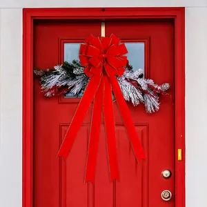 Large velvet red Christmas bow wreath for front door holiday decor with long streamers
