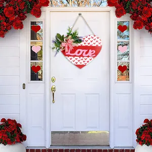 Valentine's Day wooden heart door hanger with Love sign and floral decor