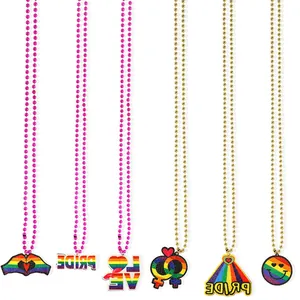 Detailed view of six colorful rainbow pride necklaces with glittery pendants and bead chains