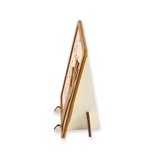 Side view of a wooden Father's Day plaque showing its sturdy desktop stand structure.