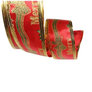 Detailed macro view of 5cm wide red Merry Christmas grosgrain ribbon with gold foil trim