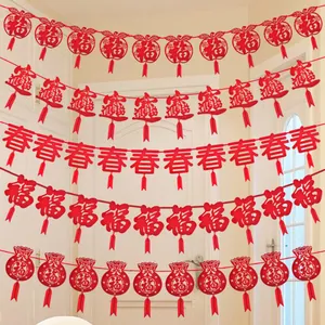 Detail view of red non-woven banners with Chinese characters for Lunar New Year.