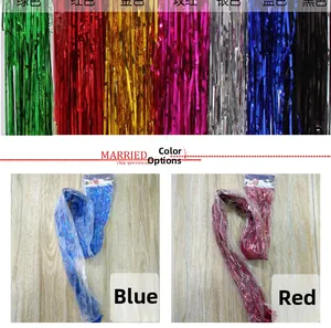 Detailed view of various colorful rain silk tinsel fringes for party backdrop decor.