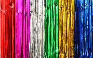 Close-up of multi-colored tinsel foil fringe curtains for party background decorations