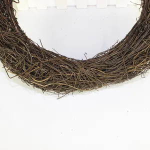 Close-up macro view of natural 23cm brown grapevine wreath for DIY holiday decor