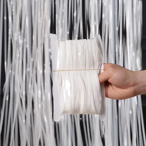 Close-up detail of 2-meter white tinsel foil fringe curtain roll for party decoration