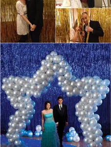Elegant blue foil fringe curtain backdrop with a silver star balloon arch for party decor