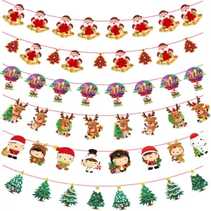Detail view showing various cartoon Christmas paper banner designs and characters.