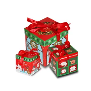 Juego de 3 cajas de regalo de Navidad festivas con cintas rojas y dibujos animados