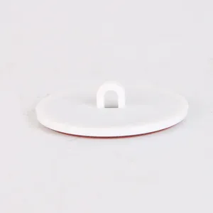 Zijaanzicht van een witte ronde zelfklevende plafondhaak voor feestdecoraties.