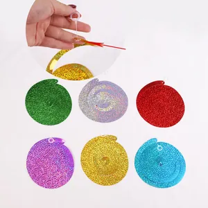 Set of six colorful glitter spiral hanging decorations for party and festive atmosphere