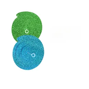 Macro detail of blue and green holographic laser spiral hanging party decorations.