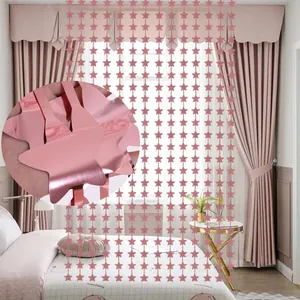 Close-up of metallic rose gold star-shaped foil curtain material detail