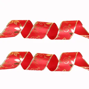Elegant red Christmas ribbon with gold floral patterns and wired gold edges for tree decor