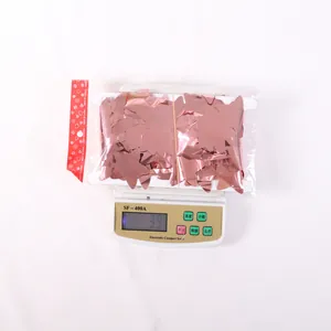 Rose gold star foil fringe curtain weighing 39 grams on a digital scale
