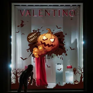 Gruselige Halloween Fensteraufkleber mit Kürbis und Fledermaus für Shop-Schaufensterdeko.