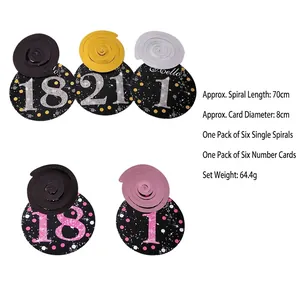 Sparkling birthday party swirl decorations with number tags 18 and 21 for anniversary