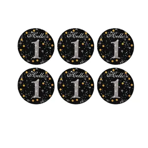 Detail of 1st birthday hanging decoration tags with glitter number one and Hello