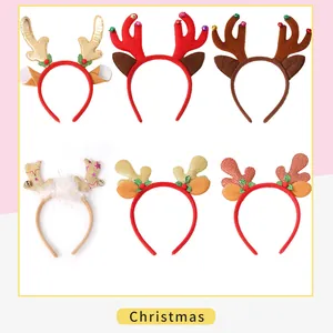 Variety of festive reindeer antler headbands with glitter, bells, and decorative details