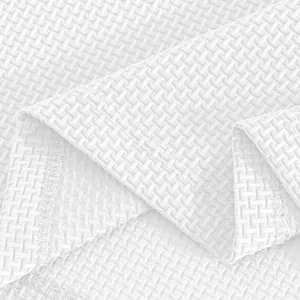 Close-up of white waffle texture fabric for breathable men's quick-dry top shirt