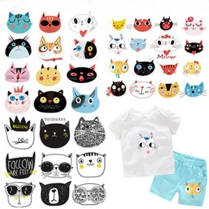 Detailed view of various cute cartoon cat heat transfer stickers for baby clothes