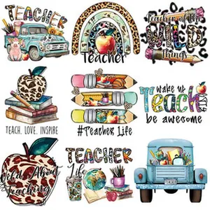 Teacher themed heat transfer stickers with leopard print apple and rainbow designs