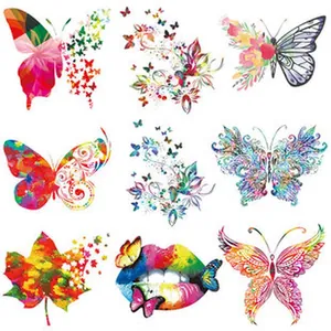 Collection of colorful butterfly, lips, and maple leaf heat transfer patches for clothing.