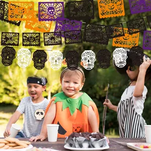 Decorative Halloween skull and spider web garland banners for outdoor Mexican party events