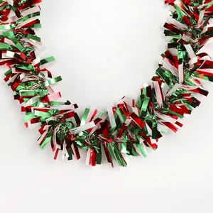 Detail of red green and white festive tinsel garland for Mexican theme party decor