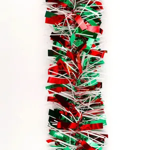 Detail of red, green, and white tinsel garland with metallic and thin silk texture