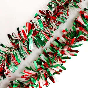 Detail of red green and white tinsel garland for festive Mexican flag themed holiday decoration