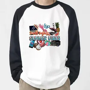 Detailed colorful Summer Vibes heat transfer print on a stylish black and white raglan T-shirt