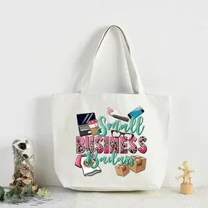 Small Business Badass heat transfer vinyl design on a white canvas tote bag detail