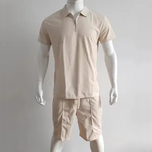 Detail view of men's beige waffle knit polo set with zipper on white mannequin