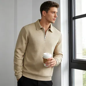 Detailed view of men's textured jacquard long sleeve polo sweatshirt in khaki