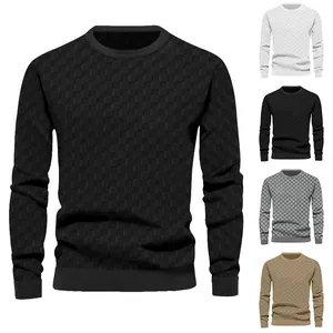 Detail showing heavy jacquard checkerboard texture on men's long-sleeve crew neck sweater