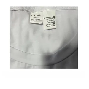 Detailed view of the care label and size tag on a white polyester sports tank top.