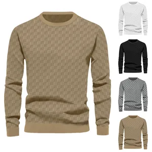 Detail of men's crew neck sweater with heavy jacquard checkerboard pattern texture