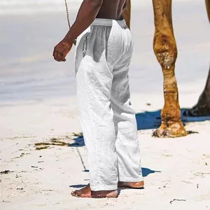Detailed view of men's breathable white cotton linen loose pants for beach vacations