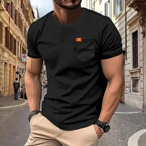 Detailed macro view of a men's casual black cotton T-shirt with a front chest pocket