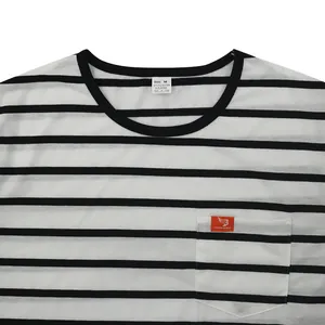 Close-up detail of men's breathable black and white striped T-shirt with pocket